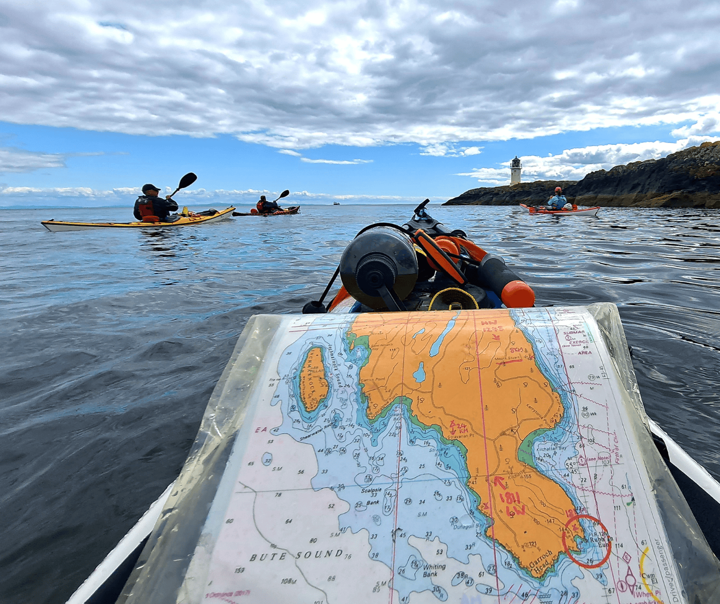 Kistie Macmillan navigating on a sea kayak expendition