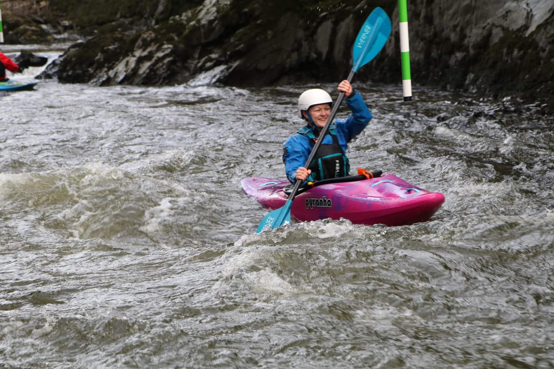 Meg Enynon white water kayaking