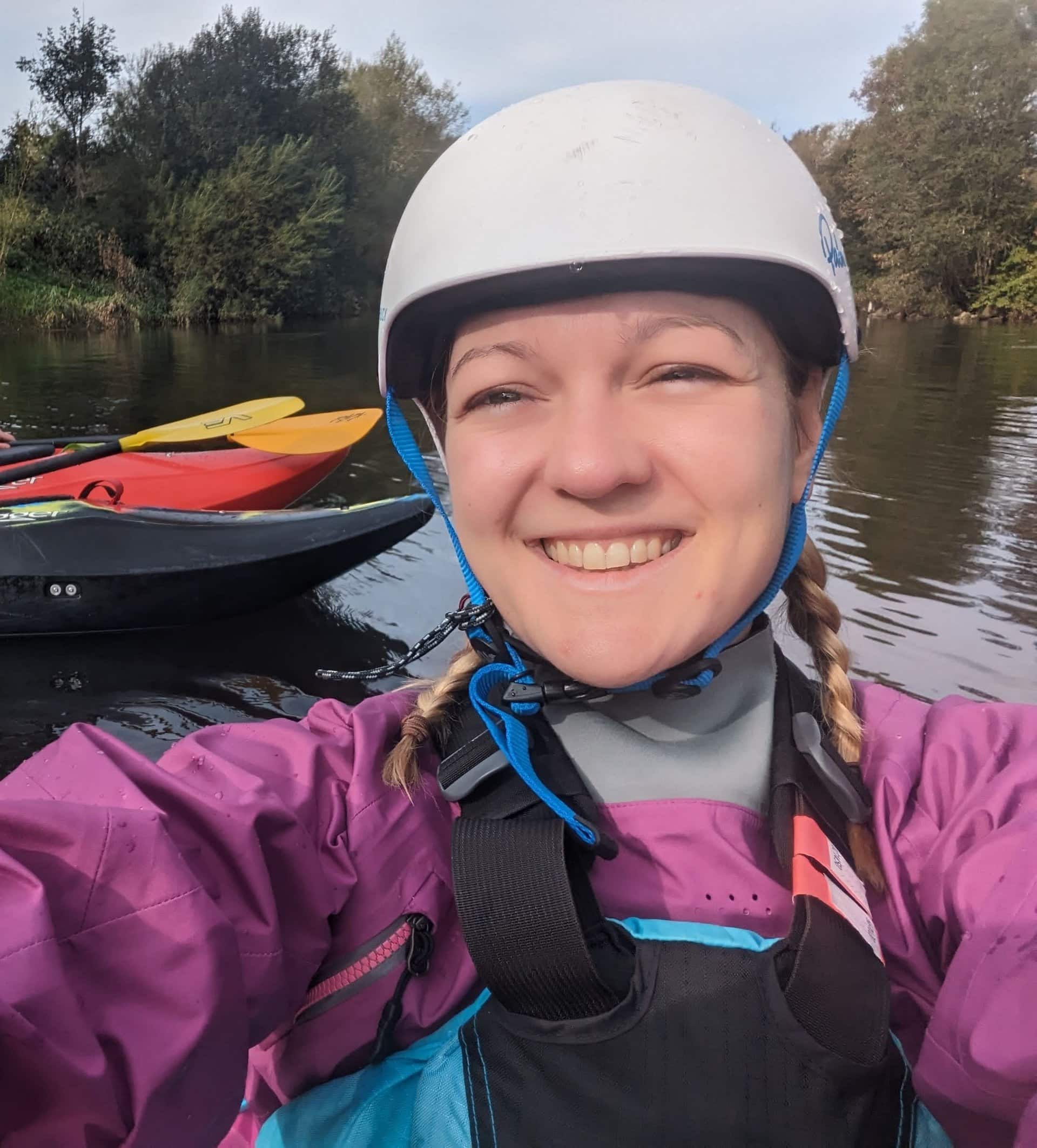 Meg Enynon white water kayaking
