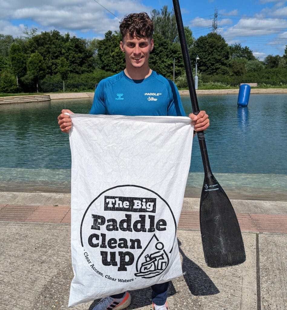 Adam Burgess with a Big Paddle Clean Up sack