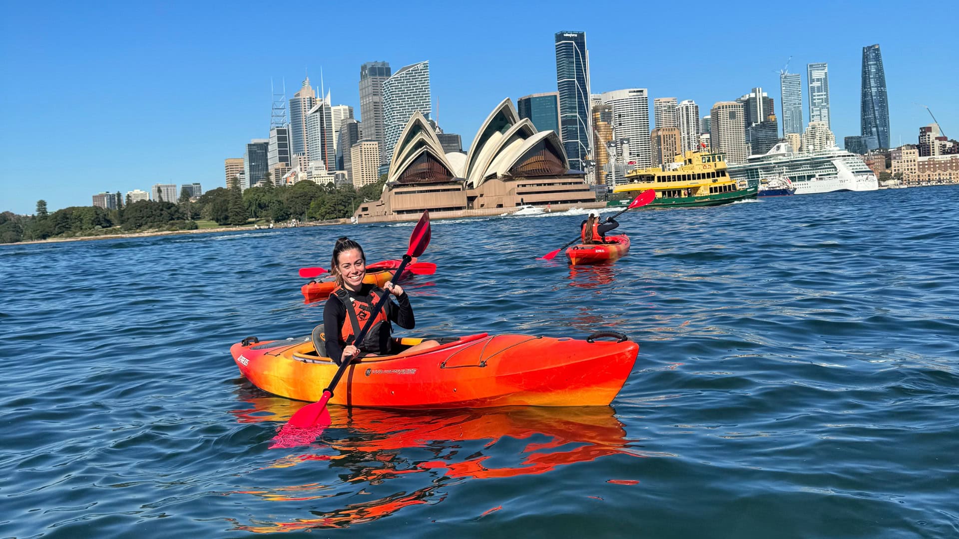 #ShePaddles Ambassador, Eleanor Addison kayaking in Sydney Harbour