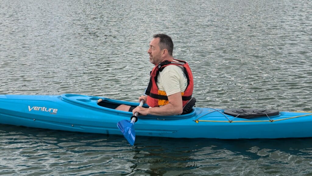 Chris Boardman in a kayak